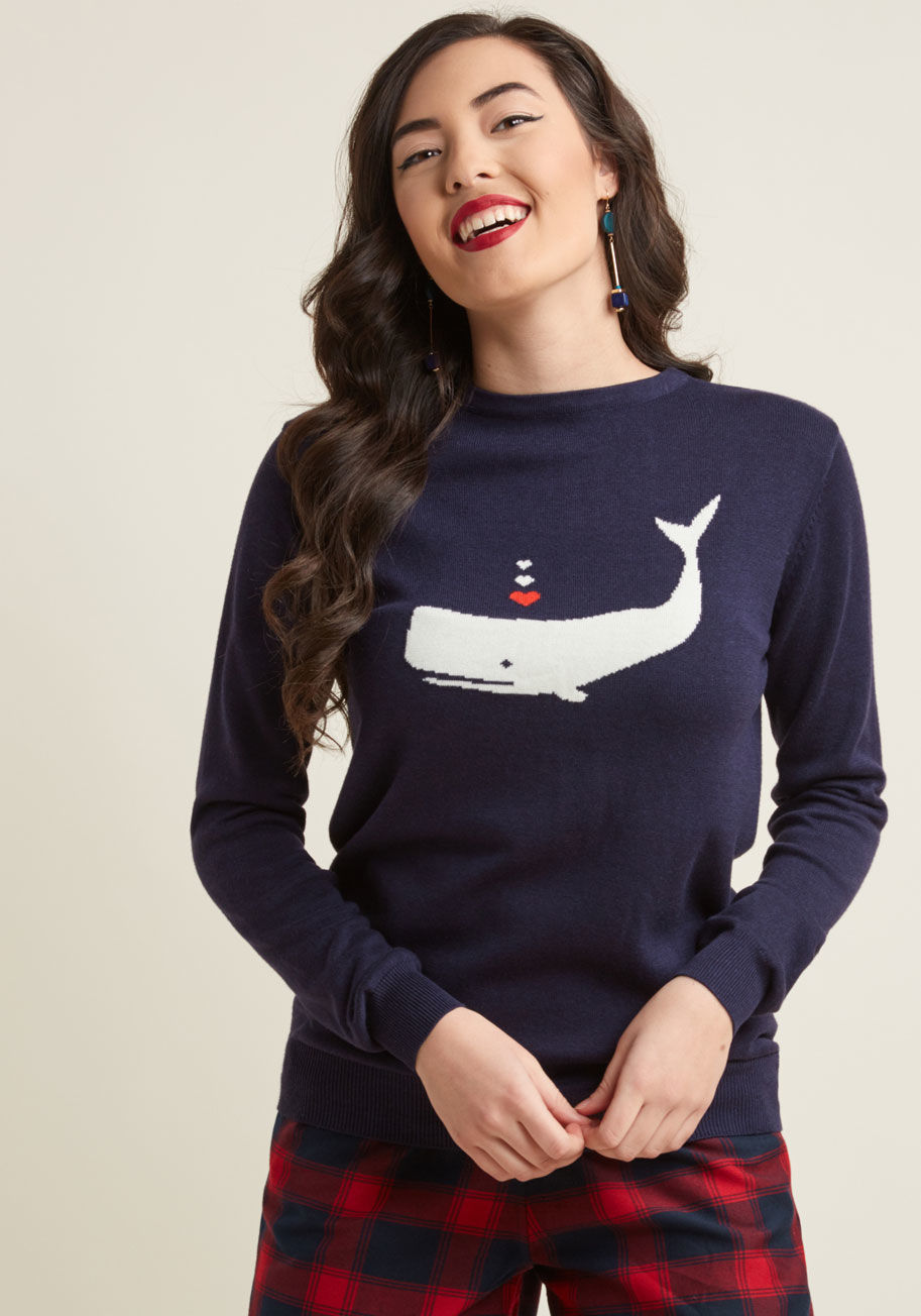 K0059 - Why settle for an ordinary top when you can enthusiastically choose to sport this navy sweater for the day? A darling offering from Sugarhill Boutique, this knit pullover features an amorous whale atop its classic silhouette, making for a look you're alwa