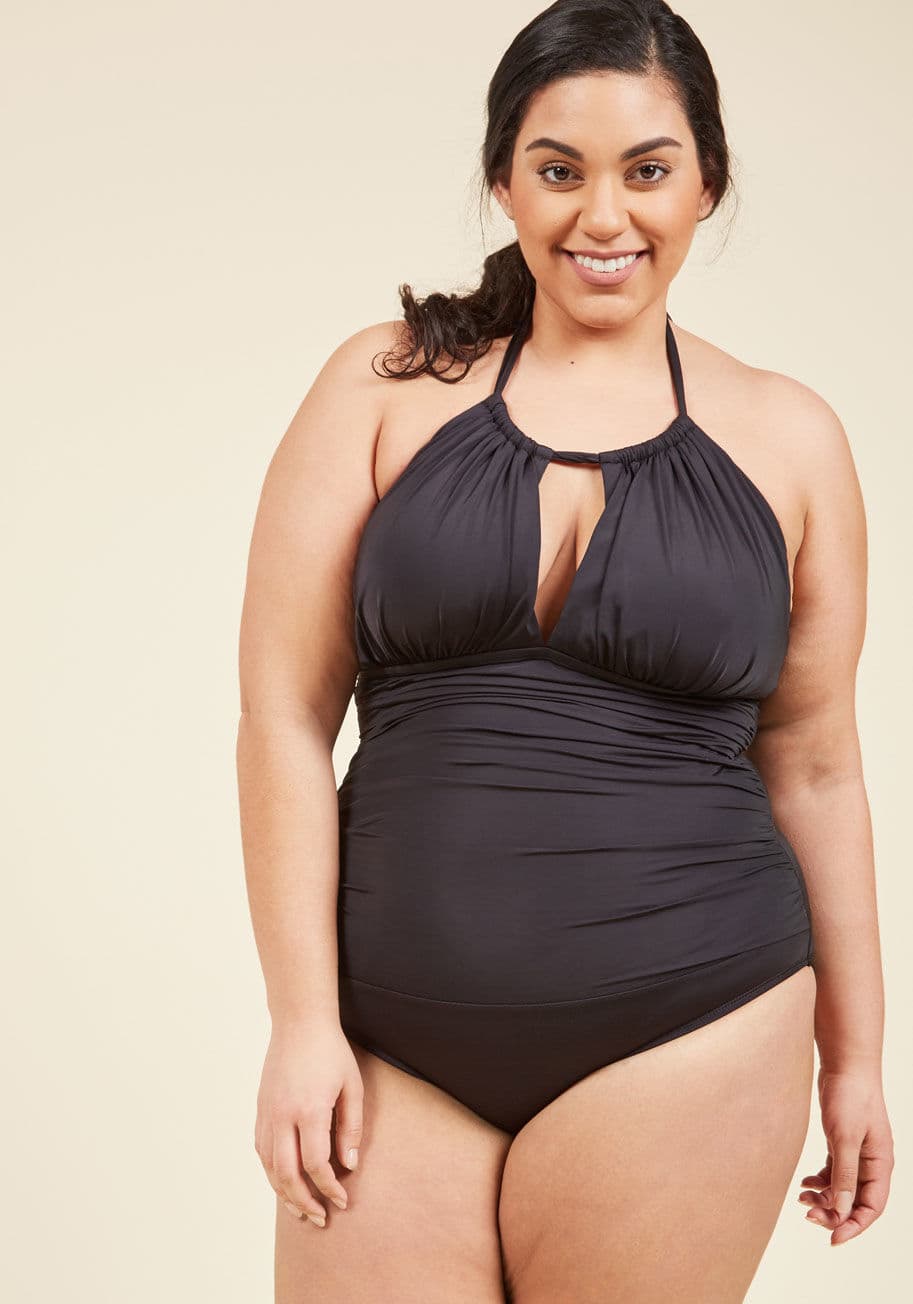 KC6K911 - Searching for a name for your latest beachfront epic, you turn to this black one-piece by Kenneth Cole for inspiration. As you reflect on the sunny days you've spent on the shore clad