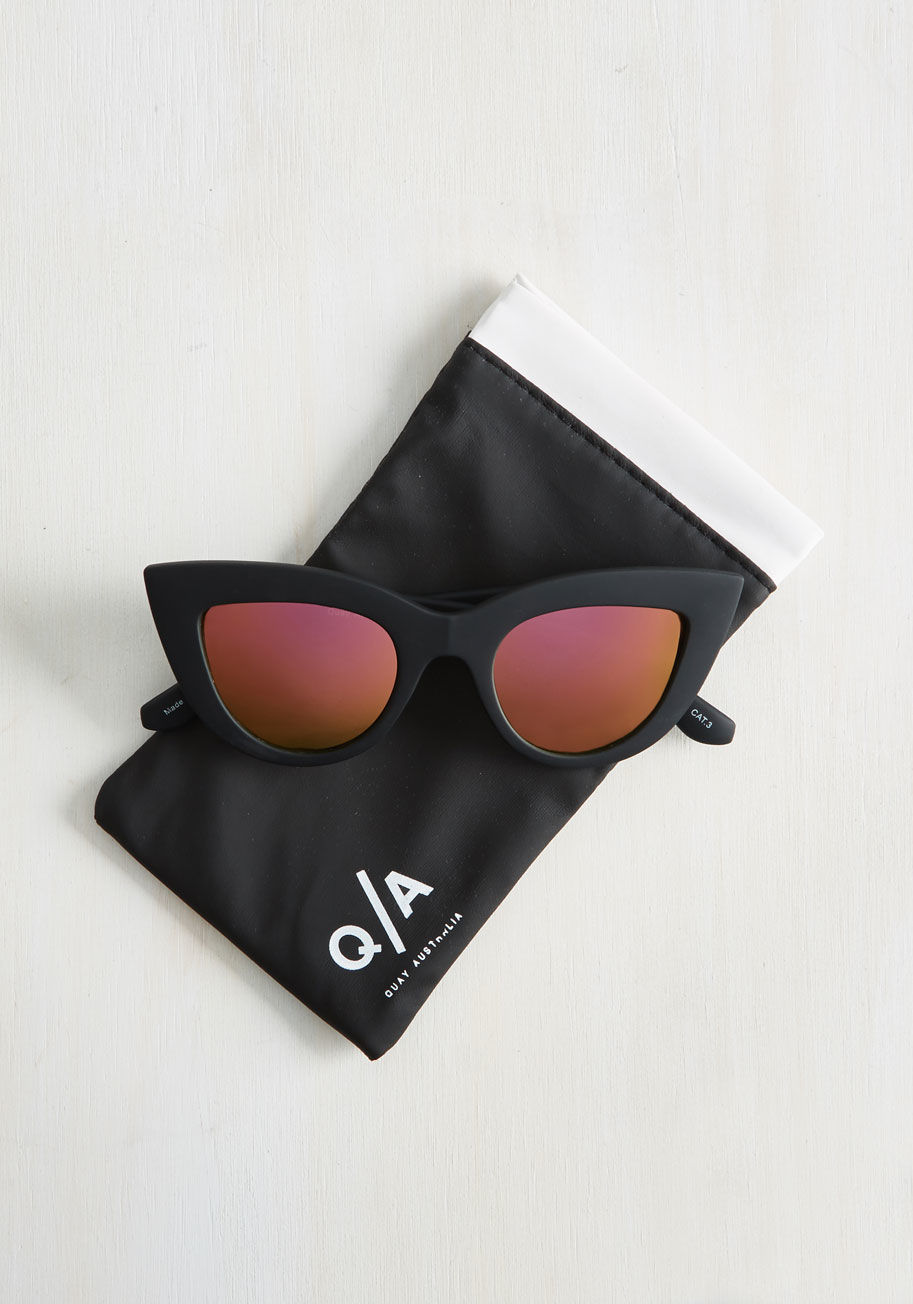 KITTI BLACK - You radiate an urban chic essence when flaunting these spectacular Kitti shades from Quay Australia! Offering 100% UV coverage within their cat-eye frames, these black sunnies are the coolest pair