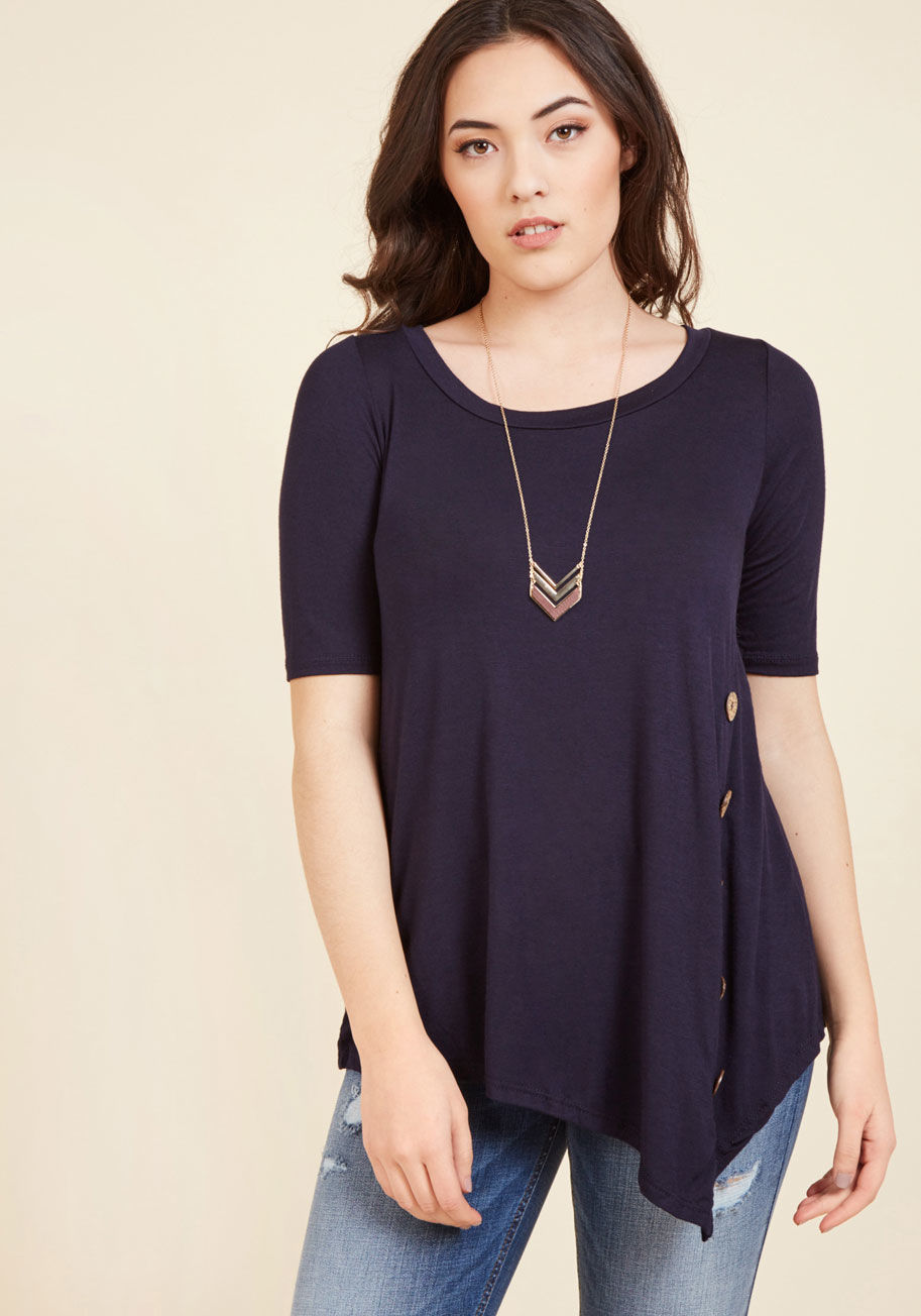 Kt326 - Imagine this - soft breezes, radiant sunshine, and this navy blue top for an afternoon at the park! Wooden buttons trim the billowy bodice of this jersey-knit, asymmetrical blouse, completing a picturesque look for your idyllic outing.