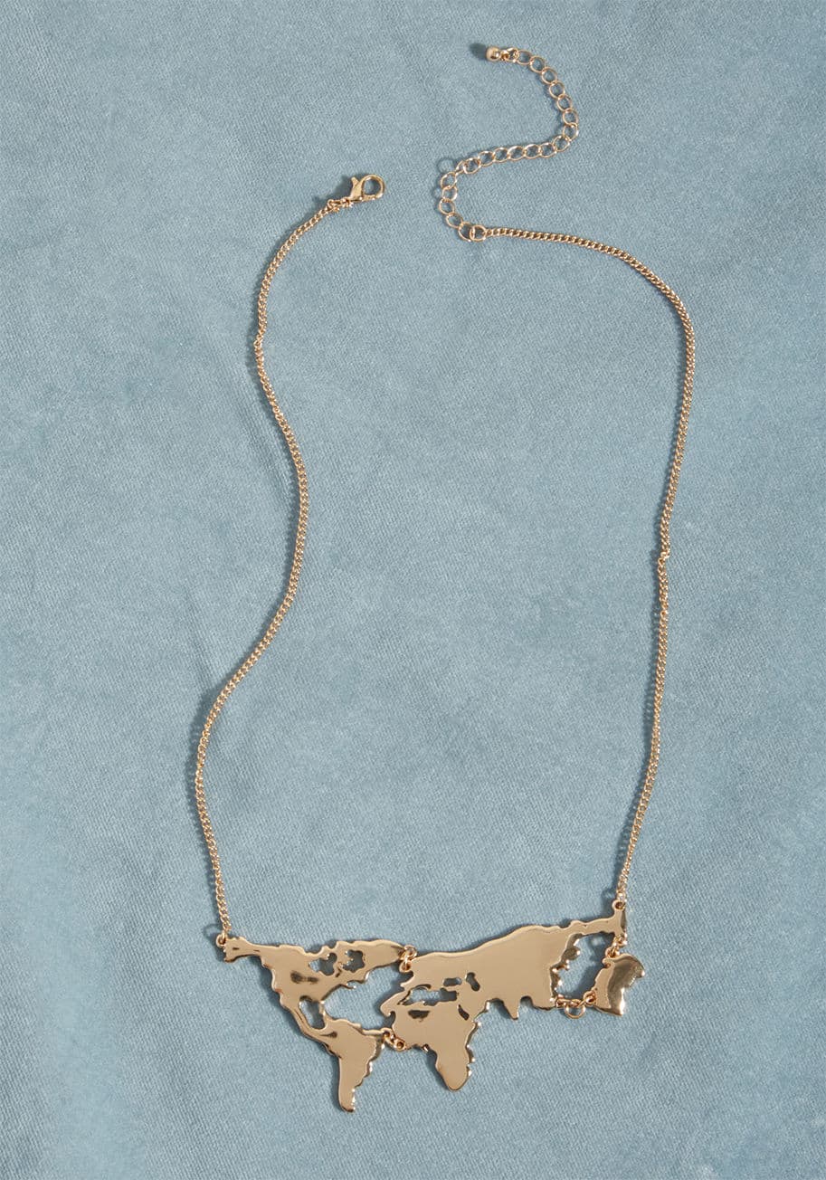 LN21523 - There are maps for exploring new cities and scenery, and now, there&rsquo;s even a map to wear as a statement necklace! Let these shiny gold continents dangle along your collar, and you&rsquo;ll impress besties and travel buddies eager to be a part of you