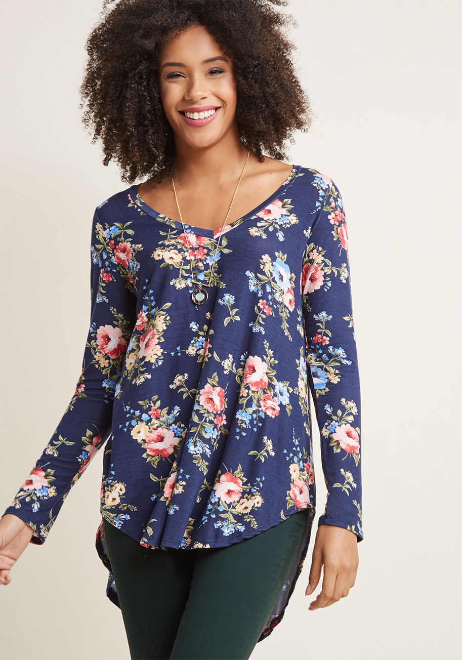 MC-1017 - Layer it on or let it stand alone as the star of your outfit - however you style this navy floral tunic, you're bound to look adorable! With a V-neck, a soft jersey knit, and a curved high-low hemline, this long-sleeved top - a ModCloth exclusive! - takes