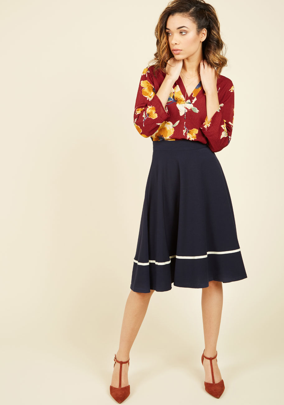 MC73552 - When you don this navy-blue A-line skirt, you channel a winning, smart style! The knit construction and midi length of this ModCloth exclusive keep you completely comfortable, while its single yellow ribbon stripe adds a colorful touch to your ensemble.