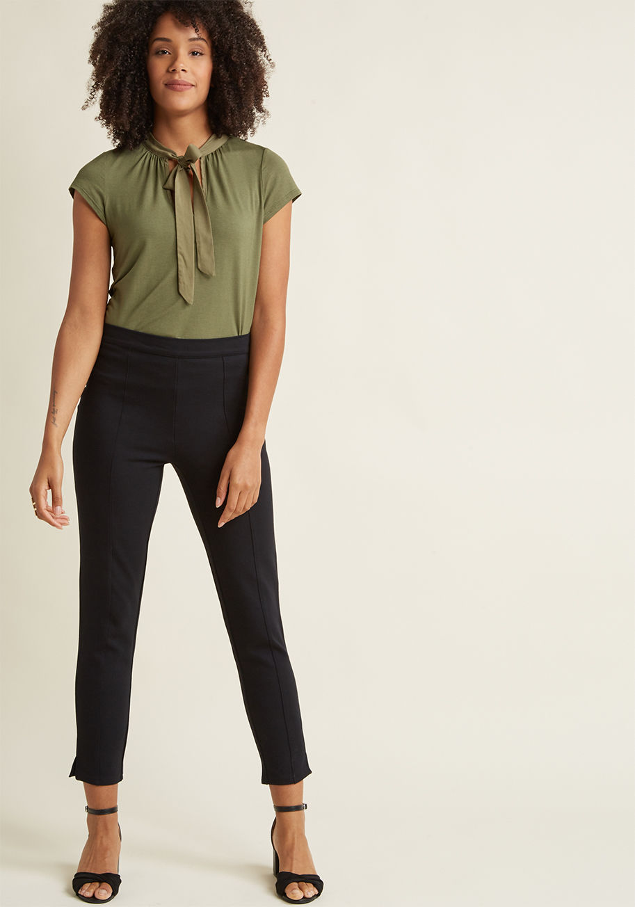 MCB1037 - For tonight&rsquo;s on-the-town adventure, you want to look mighty chic &lsquo;til morning! Knowing comfort is key for longevity, you choose these sleek black pants - part of our ModCloth namesake label. With a close fit, sharp front seams, and slight ven