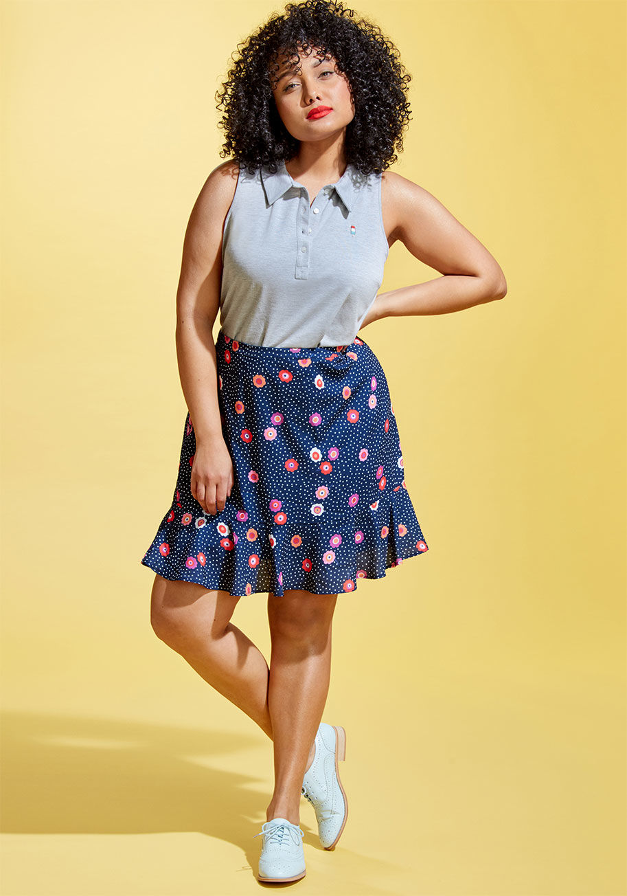 MCB1125 - What an incredible match this navy skirt is for your ultra-approachable personality! As if your signature smile wasn't enough, you totally catch everyone's attention