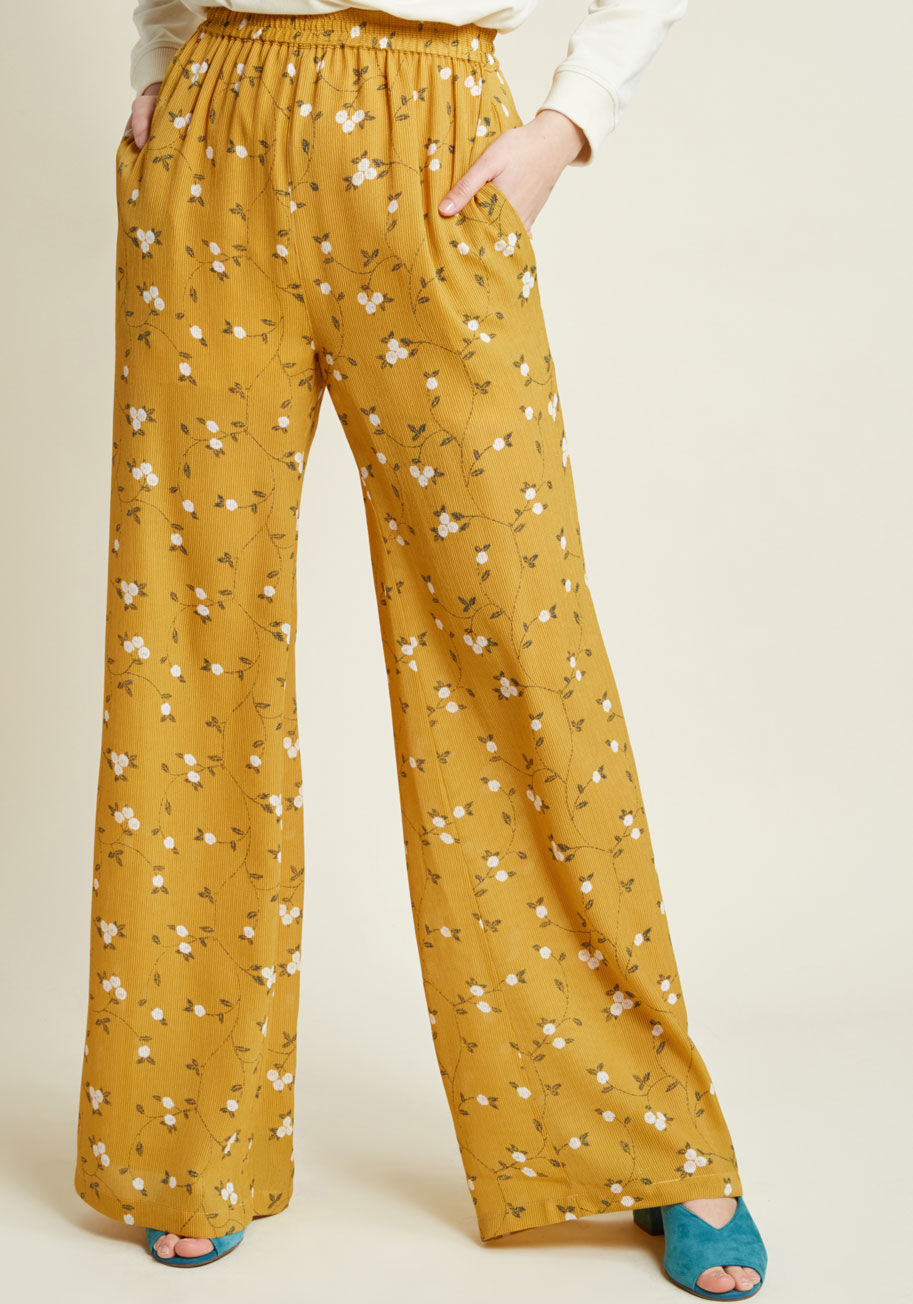 MCB1172A - In these comfy pants, you've got 'flair' down to there and you aren't afraid to flaunt it! A fab look from our ModCloth namesake label, these mustard-colored bottoms boast an elasticized waist, pockets, and loose legs patterned with white flowers 'n' deep