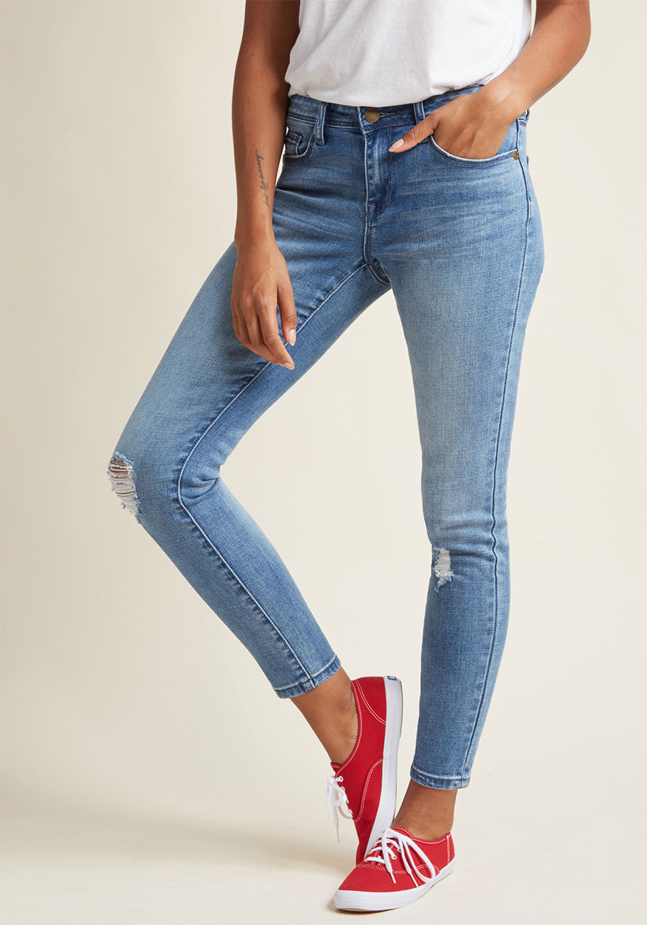 MCB1207B - The best part about these ripped skinny jeans? You can wear 'em pretty much anywhere! The perfect weekend look to pair with tees, tanks, and sweaters, these mid-wash ModCloth namesake label bottoms - with minimal stretch for the best break-in experience -