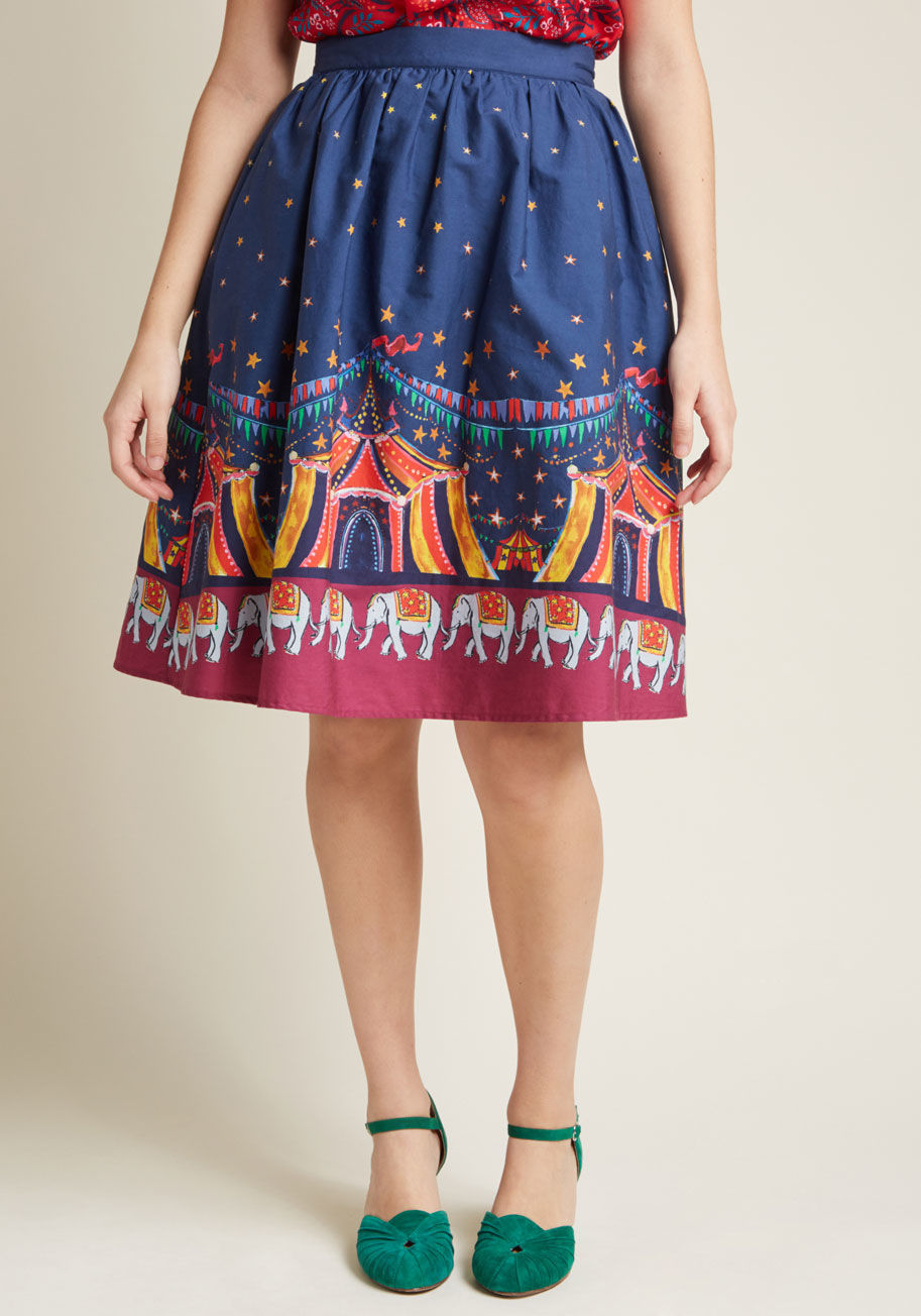 MCB1303B - Whoever believes staple pieces should only be solid needs to met the sweet versatility of this navy midi skirt! A cotton offering from our ModCloth namesake label, this A-line makes it a pleasure to pair its belt loops, hidden pockets, and colorful big to