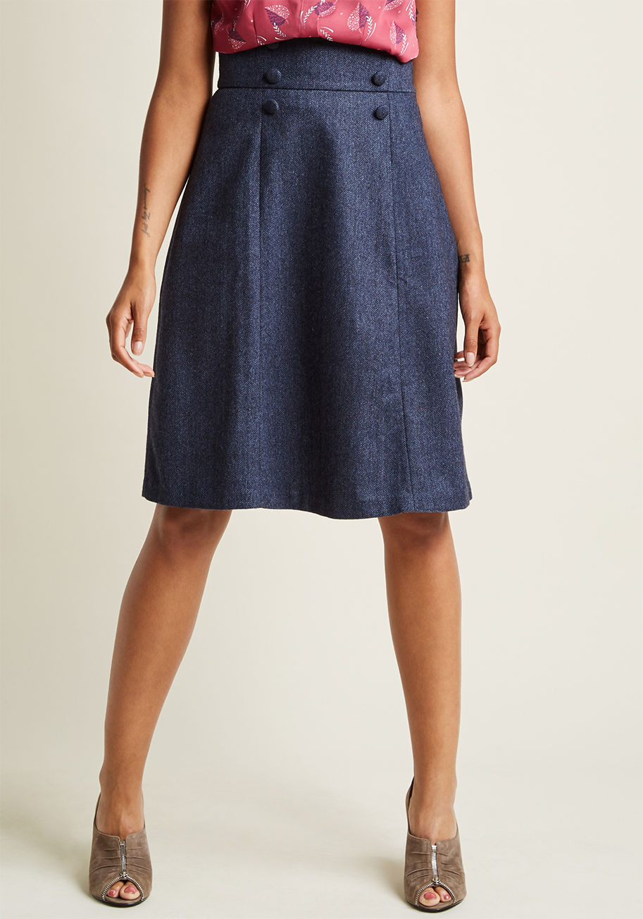 MCB1305 - Looking to feel nostalgic, polished, and absolutely effortless? Turn to this navy midi skirt from our ModCloth namesake label to embody those attributes - and many more! Matching herringbone buttons decorate this A-line's high waist, while a tweed-like te