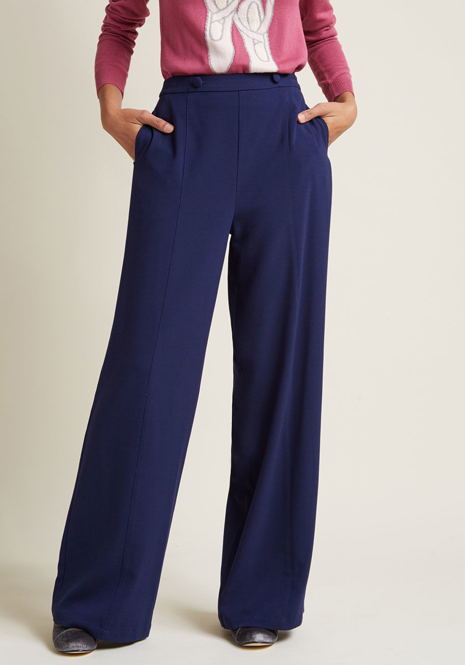 MCB1308 - The notorious need for desk to dinner ensembles is the real deal, and so are these navy blue pants! Part of our ModCloth namesake label, these wide-leg trousers feature a high waistline with decorative, cloth-covered buttons, front seams, and side pockets