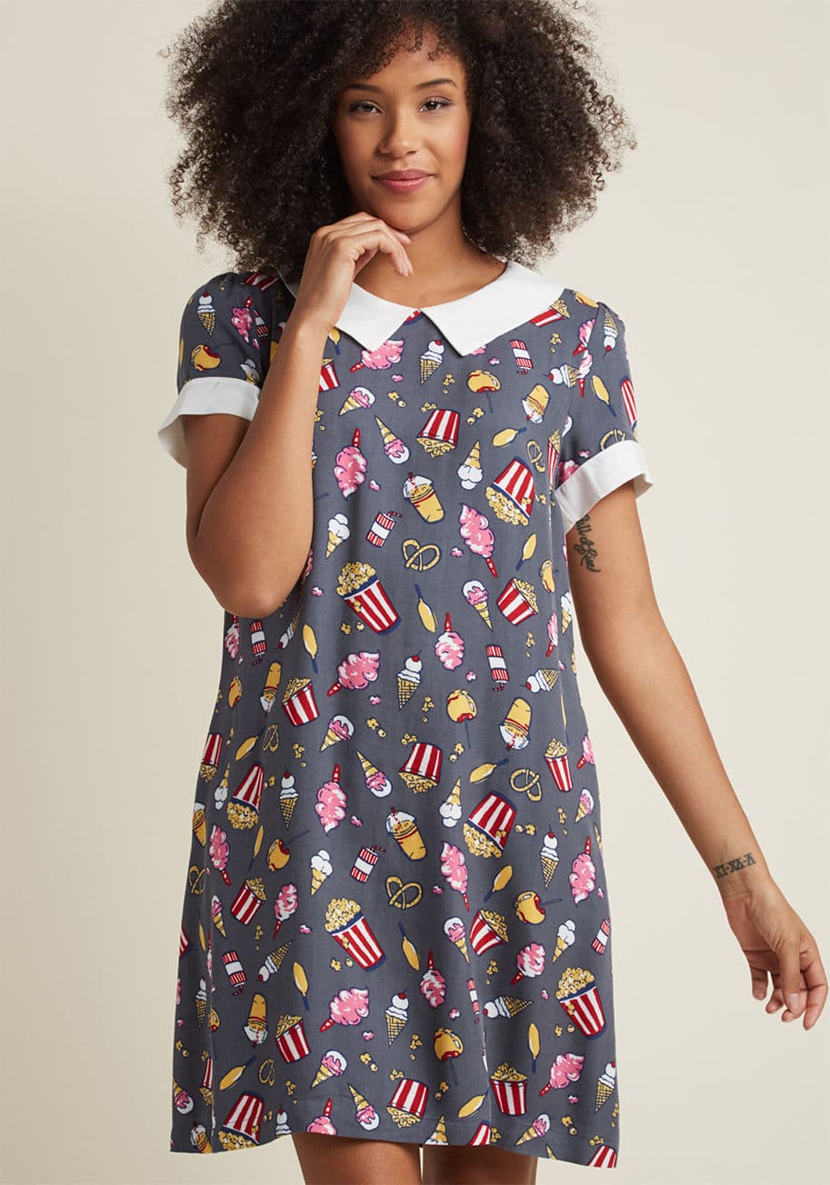 MCD1155A - From the kitchen to the carnival, this grey babydoll dress expresses your appreciation for yummy pickings! Part of our ModCloth namesake label, this pocketed A-line features a white collar, cuffed short sleeves, and a colorful print of your favorite carni