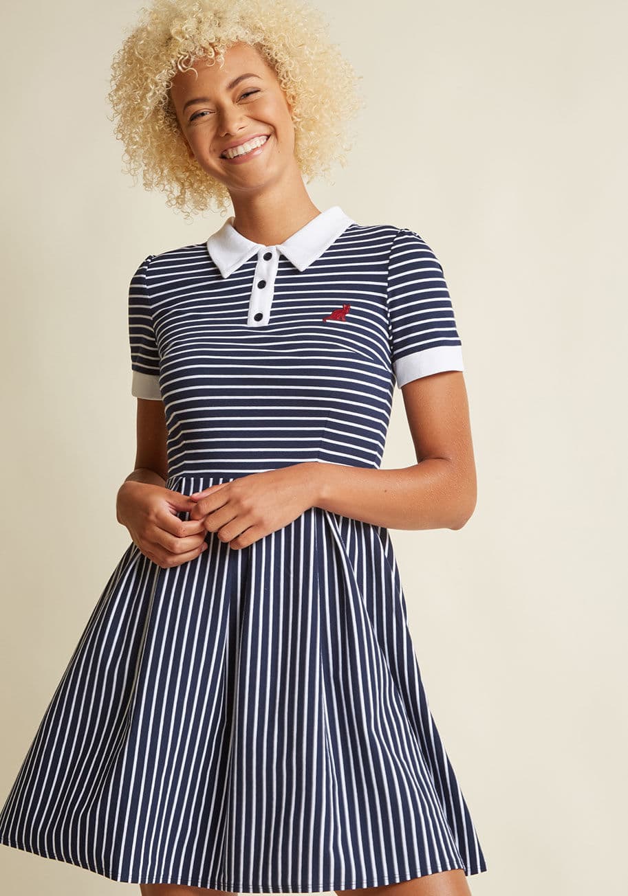 MCD1219A - In this navy dress from our ModCloth namesake label, you boast your earned status of unconventional coolness! Lightly puffed shoulders frame the collared V-neck of this soft knit frock, while an embroidered maroon cat, white stripes, and prim pleats make 