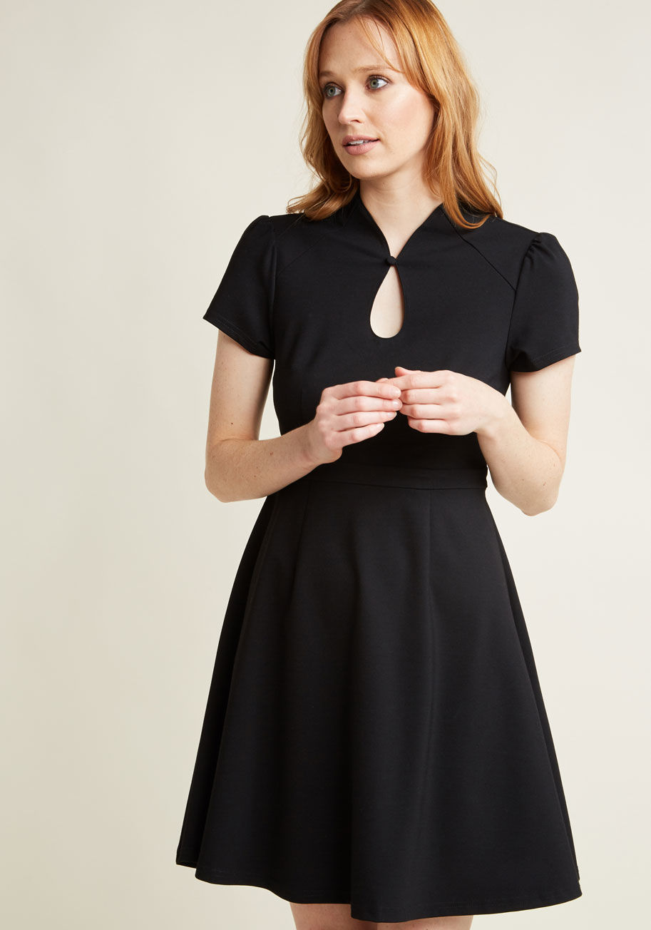 MCD1417 - Proclaim your savvy for being a socialite by sporting this black dress. Part of our ModCloth namesake label, this '50s-inspired frock is an elevated pick that adds beau-monde style to your wardrobe with its buttoned keyhole closure, slightly puffed sleeve