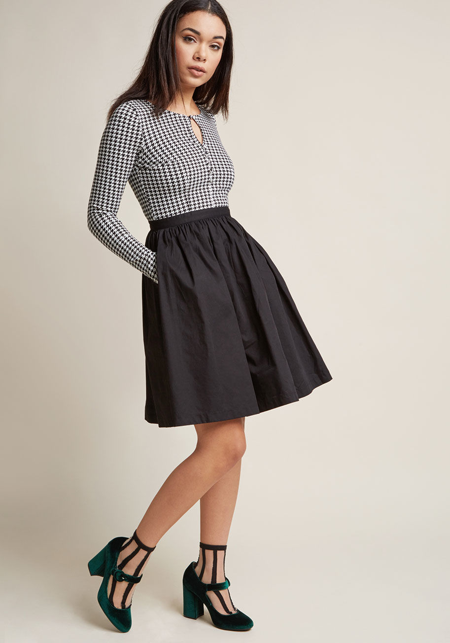 MCD1426A - Embodying class and sass, this long sleeve dress from our ModCloth namesake label is a real treat! A houndstooth-printed bodice crafted from ponte knit fabric - complete with a keyhole neckline and delicate buttons - shares the stage with this frock's poc