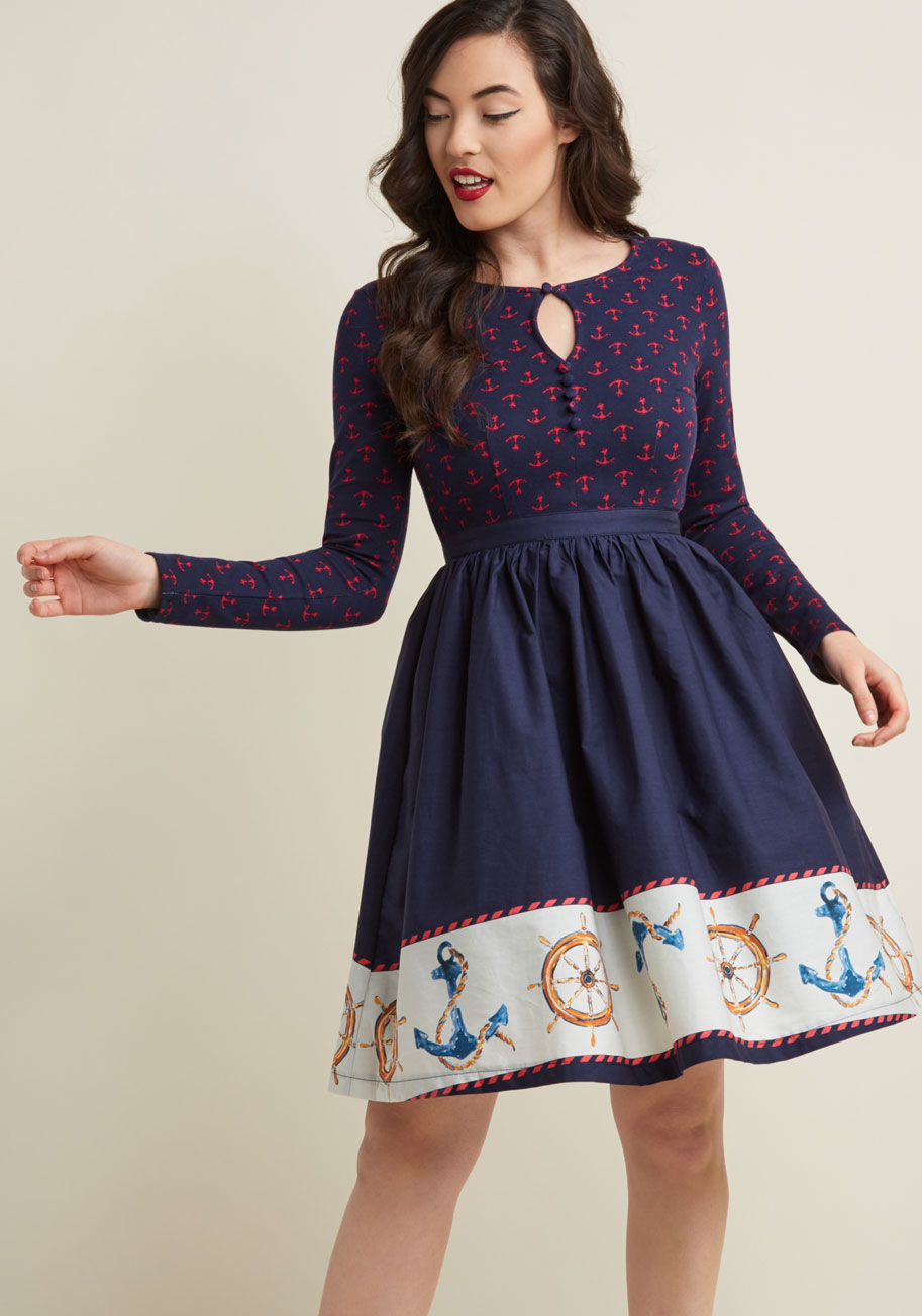 MCD1426B - Embodying class and sass, this long sleeve dress from our ModCloth namesake label is a real treat! An anchor-printed bodice crafted from ponte knit fabric - complete with a keyhole neckline and delicate buttons - shares the stage with this navy frock's po