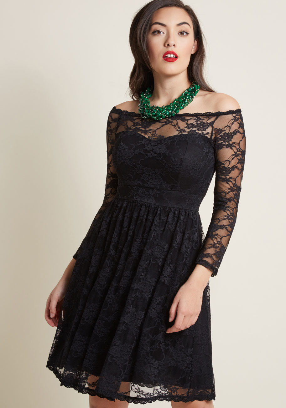 MCD1427 - Step aside, fairytale fashions, this black lace dress is the new star of your storyline! Part of our ModCloth namesake label, this off-shoulder frock flaunts sheer 3/4-length sleeves, and defined waist, and a vintage-inspired vibe that will remain romanti