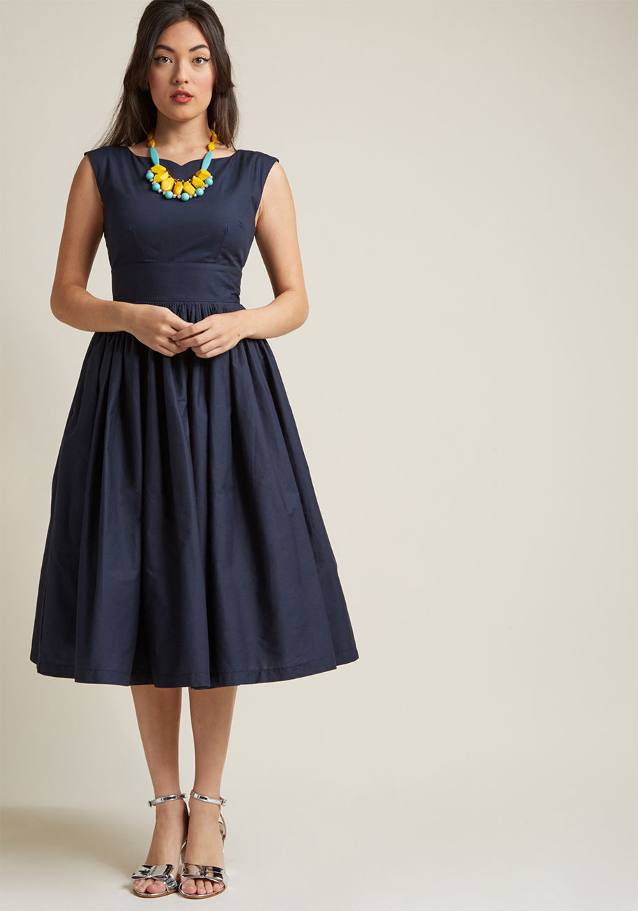 MCD1433 - The perfect retro treasure can be hard to come by - luckily, your style sense led you right to this navy blue fit and flare! A vintage-inspired offering from our ModCloth namesake label, this cotton midi lends its notched bateau neckline, gathered waist, 