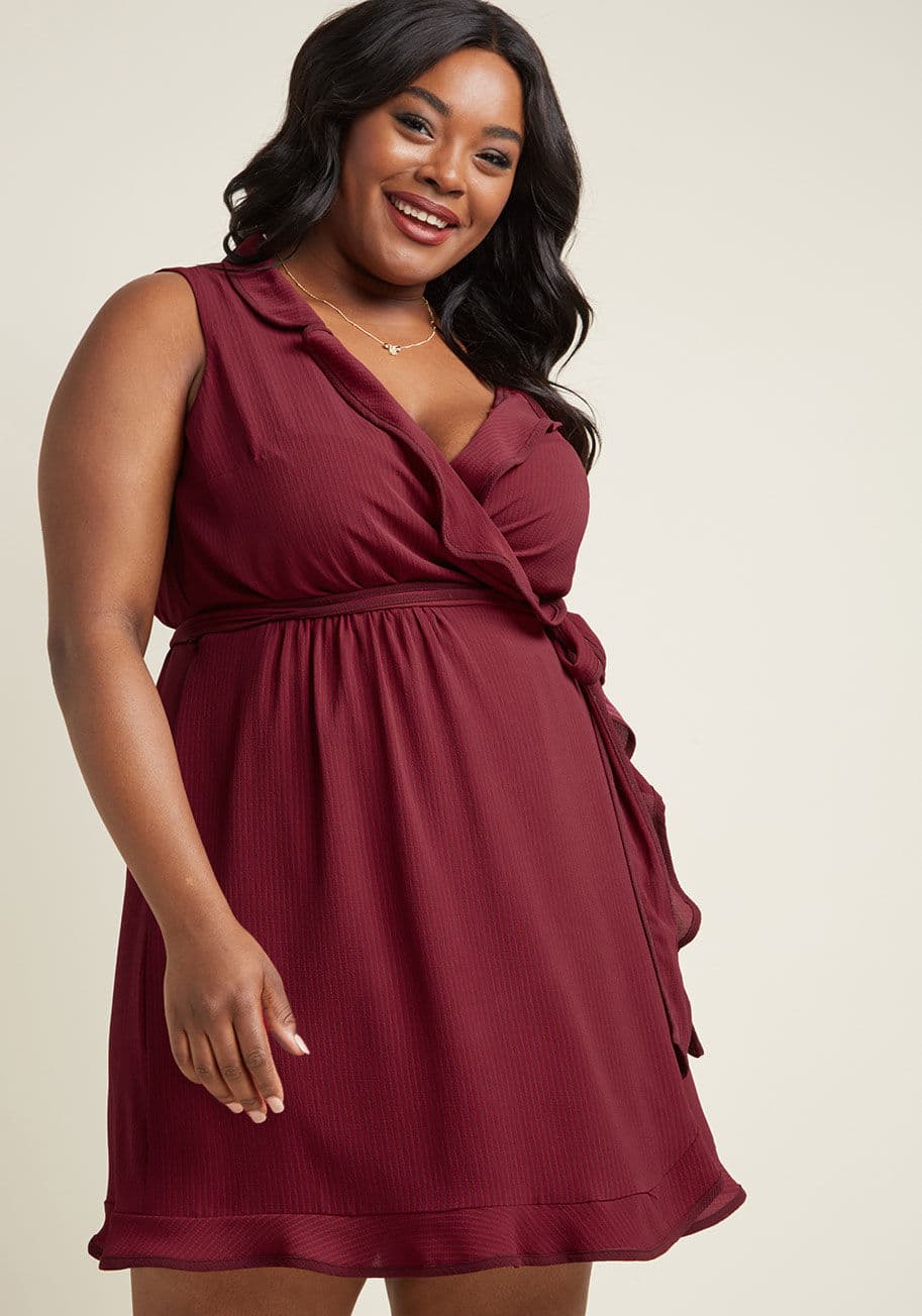 MCD1462 - Perfectly pulled together but not excessively fancy, this fuchsia-and-brick striped wrap dress is just the ticket for spiffing up your Saturday! Burgundy piping glows along the collar and ruffled trim of this ModCloth namesake label frock, bringing sunny 