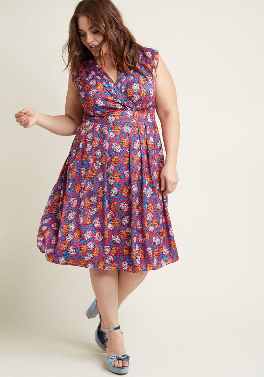 MCD1463 - The pintucked surplice neckline and pleated skirt of this midi dress are directly responsible for rejuvenating your spirit! Such vital details could totally stand alone, but this ModCloth namesake label style goes the extra mile by showcasing a vibrant or