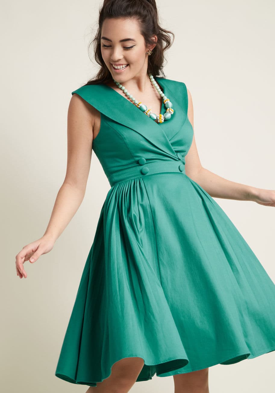 MCD1492 - You'll always be the first to arrive at every soiree, because you'll have known since the invitation arrived that it's this cotton fit-and-flare dress you'll flaunt! A vintage-inspired stunner from our ModCloth namesake label, this double-breasted dress f