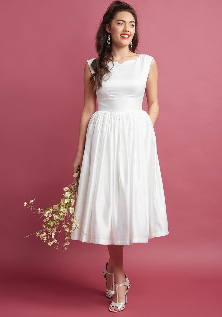 MCD1499 - The perfect retro treasure can be hard to come by - luckily, your style sense led you right to this white fit and flare! A vintage-inspired offering from our ModCloth namesake label, this satiny midi lends its notched bateau neckline, gathered waist, and 