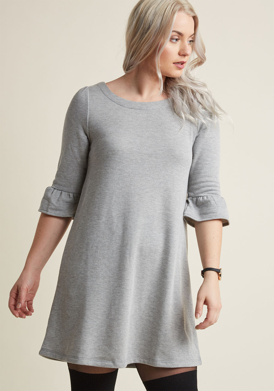 MCD1530 - Even the smallest errand on a weekend can be made stylish with this grey shift dress! With ruffled 3/4-length sleeves and a black back tie, this piece from our ModCloth namesake label has you covered through all your to-dos - and a celebratory coffee shop