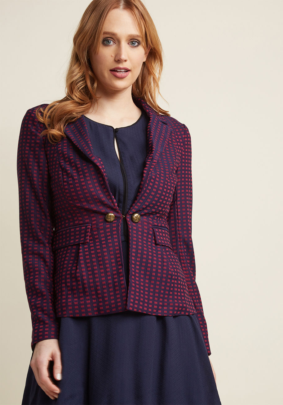 MCO1100 - As a practitioner of polished appearances, you feel called to take this jacquard blazer for a spin! While the decorative gold buttons and navy-and-maroon grid print of this professional piece are what catch your eye, it's the feminine bow atop its peplum-