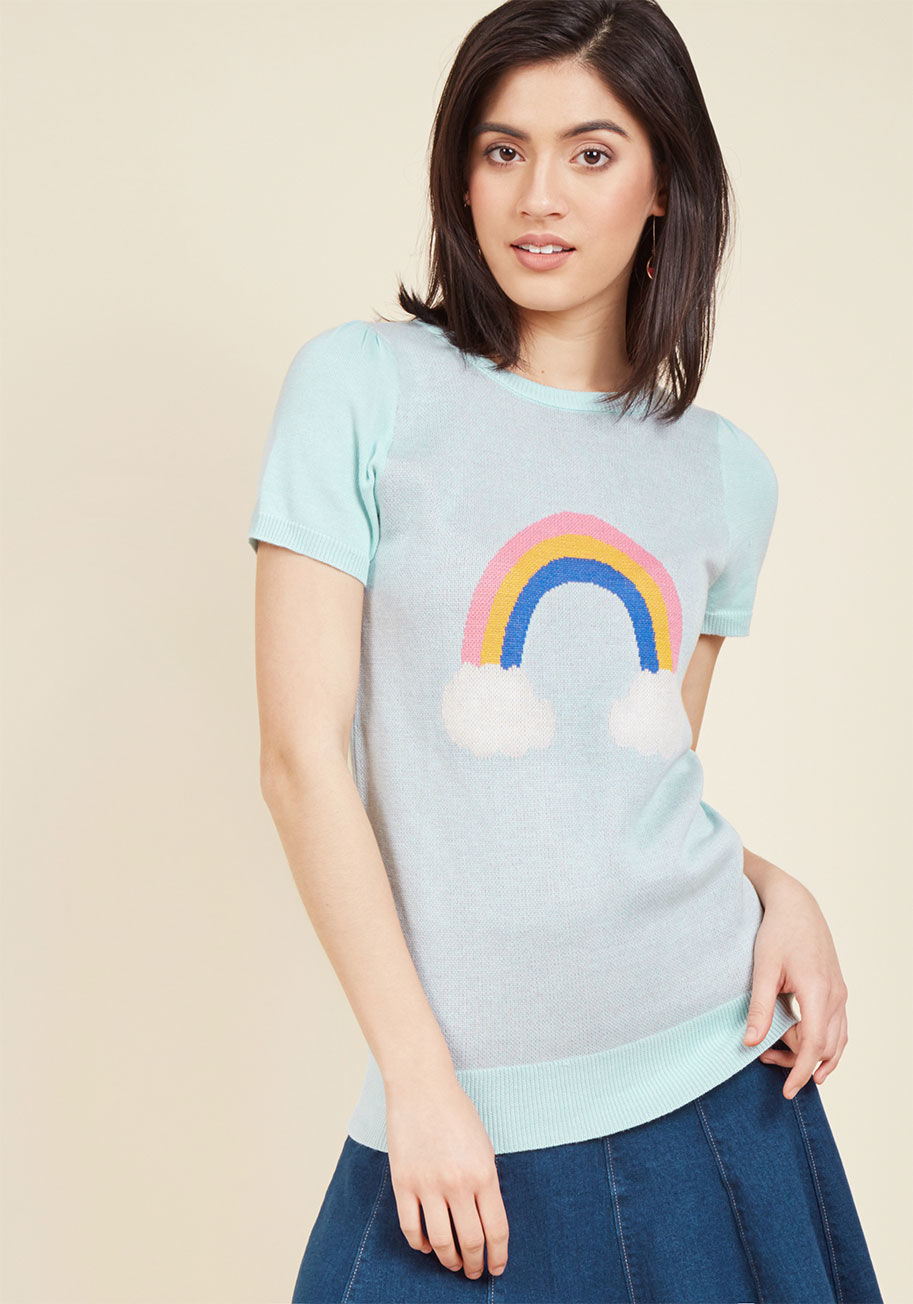 mcs1091 - Your inclination toward this short-sleeved sweater will grow into full-blown obsession the first time you slip into its light blue knit! A lighthearted piece from our ModCloth namesake label, this retro top touts a simple rainbow intarsia and a charm that