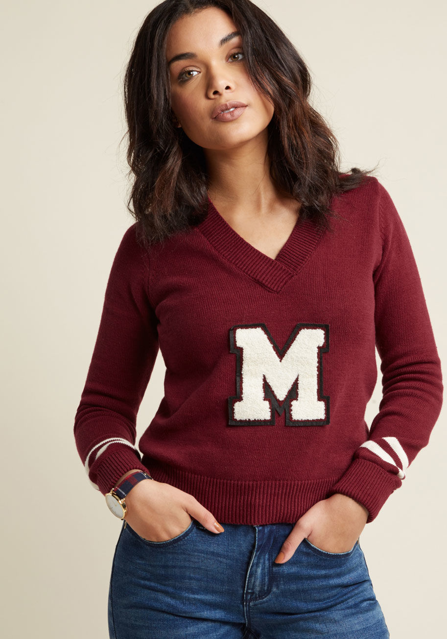 Mcs1121 - Smart, spirited, and stylish - that's what you are and that's exactly how this cotton knit sweater portrays you to passersby! Part of our ModCloth namesake label, this berry-colored V-neck reps your enthusiasm with ivory stripes near the sleeve cuffs and 