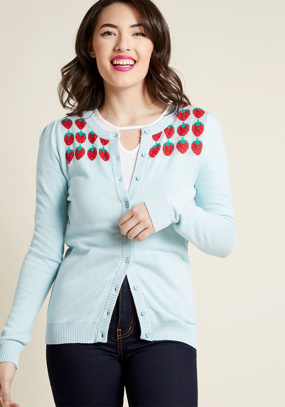 MCS1210 - Agreeing to polish off your outfit with this sky blue cardigan is a move made towards harvesting your happiness! An adorable offering from our ModCloth namesake label, this button-up sweater features a bundle of intarsia strawberries between each subtly-p