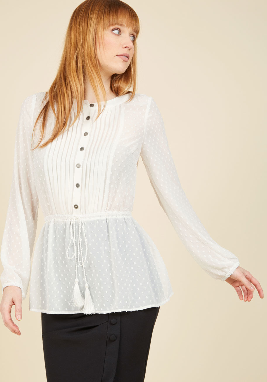 MCT1059B - You appreciate the true beauty of this world - the setting sun, the open ocean, and this ivory top from our ModCloth namesake label. With its pintucked placket, drawstring waist, elasticized sleeve cuffs, and Swiss-dotted details, this blouse is the epito