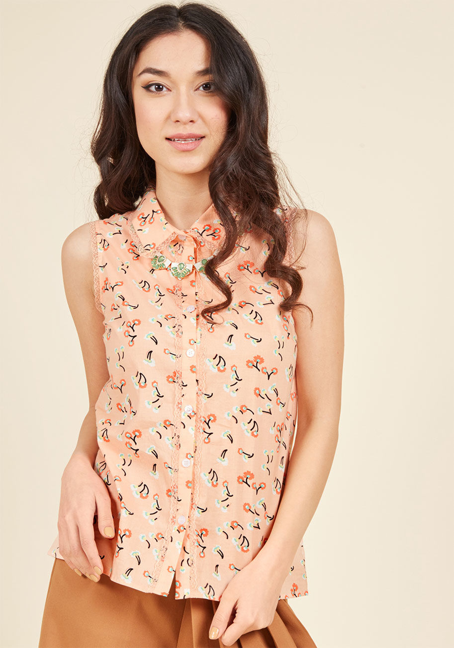 MCT1100A - That smile that forms when you're feeling confident? This light coral blouse will keep it going strong! Polished with a peppy collar, a flower print, and delicate lace trim, this cotton button up from our ModCloth namesake label brings out your best self.