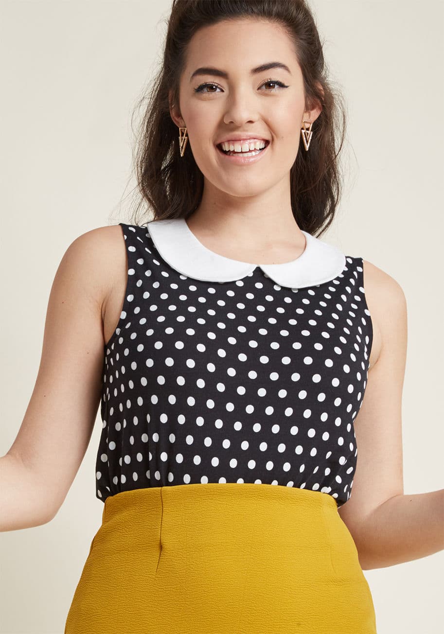 MCT1116A - This dotted top is like a basic, but better! Part of our ModCloth namesake label, this black knit expresses lighthearted style with its white Peter Pan collar, buttoned back keyhole, and sweet softness. Hello, new favorite!