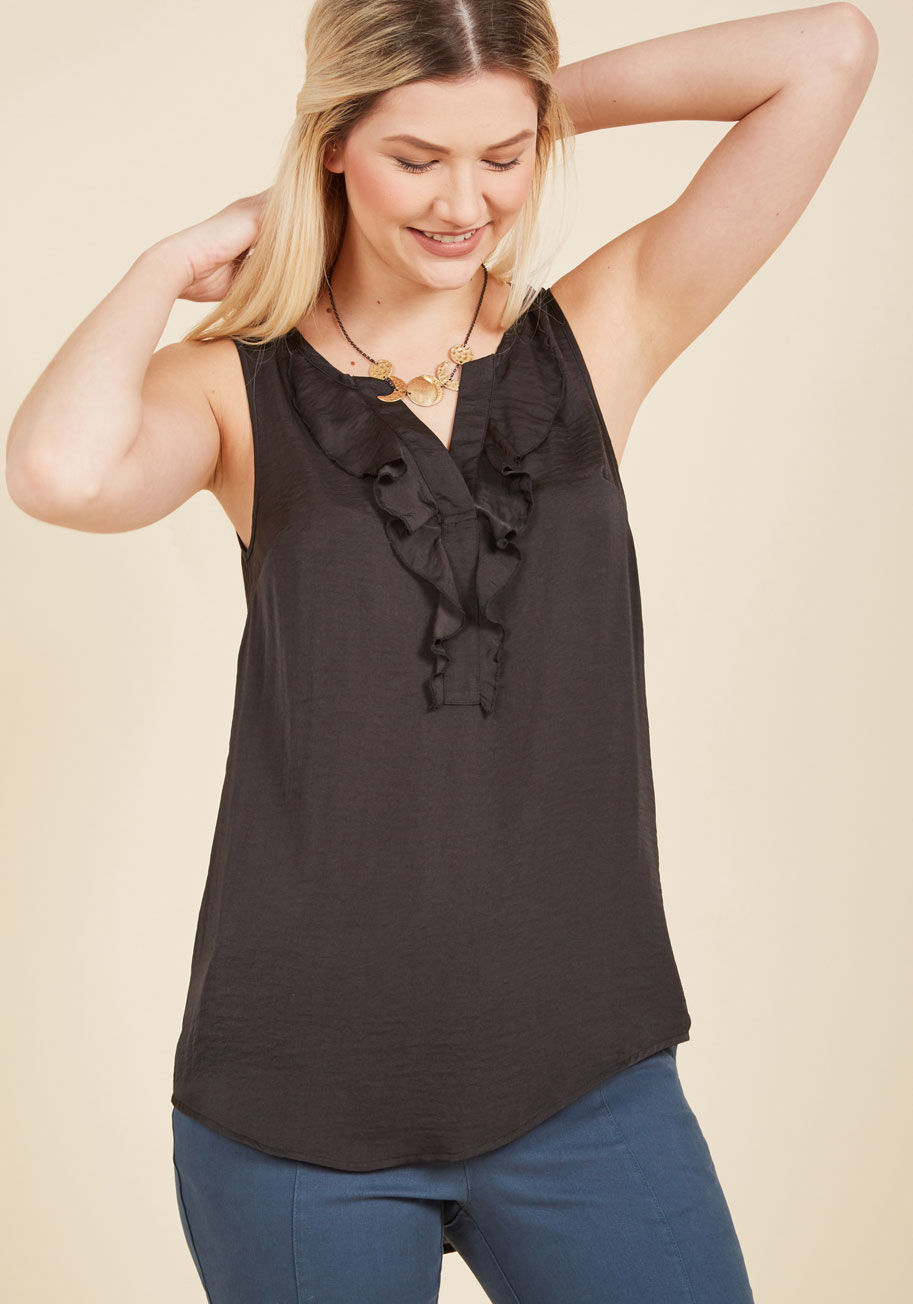 MCT1125 - With an uplifted attitude and this black blouse from our ModCloth namesake label setting the tone for the day ahead, you feel like you can accomplish anything! The ruffled V-neck and thoughtful bustline darts of this silky, sleeveless top prove themselves