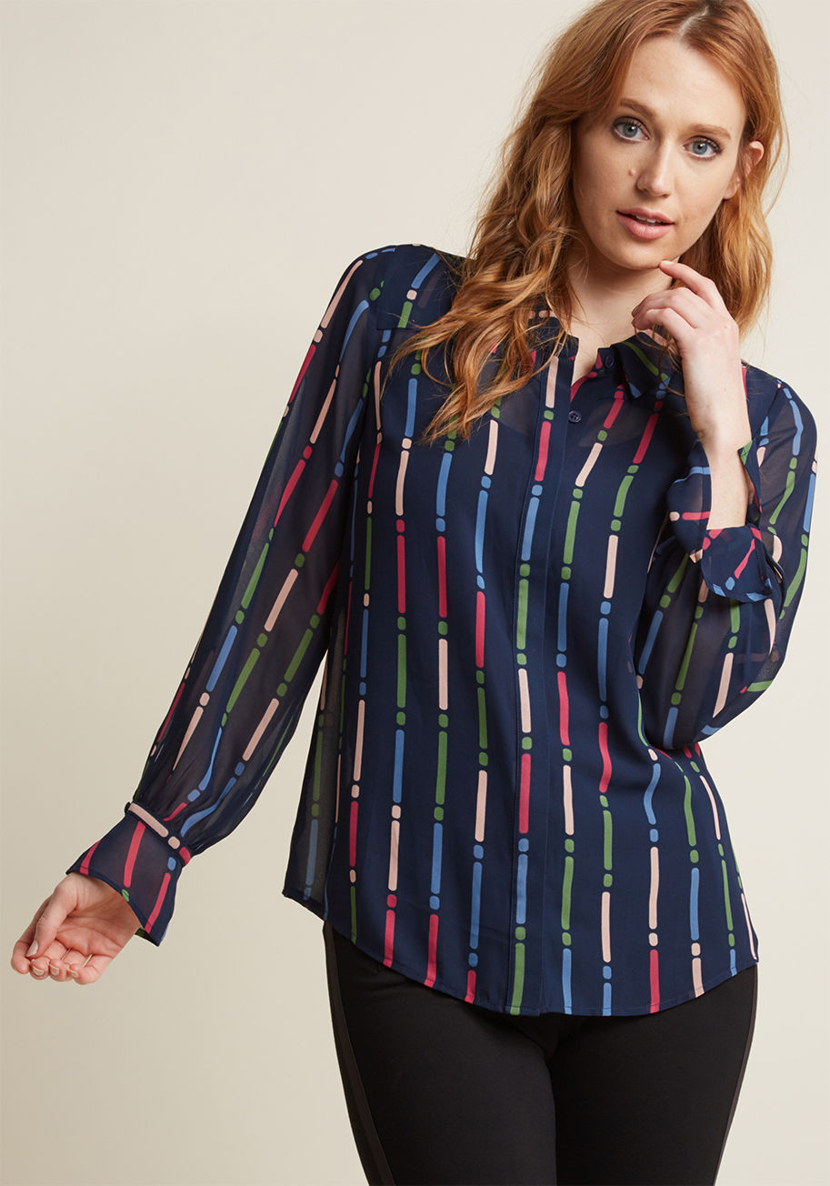 MCT1473A - Your wardrobe is craving a blouse update, and this navy top from our ModCloth namesake label is here to satisfy! From its hidden button placket to its bishop sleeves, flounced cuffs, and cornflower, carnation, rose, and clover green dot-and-dash pattern, 