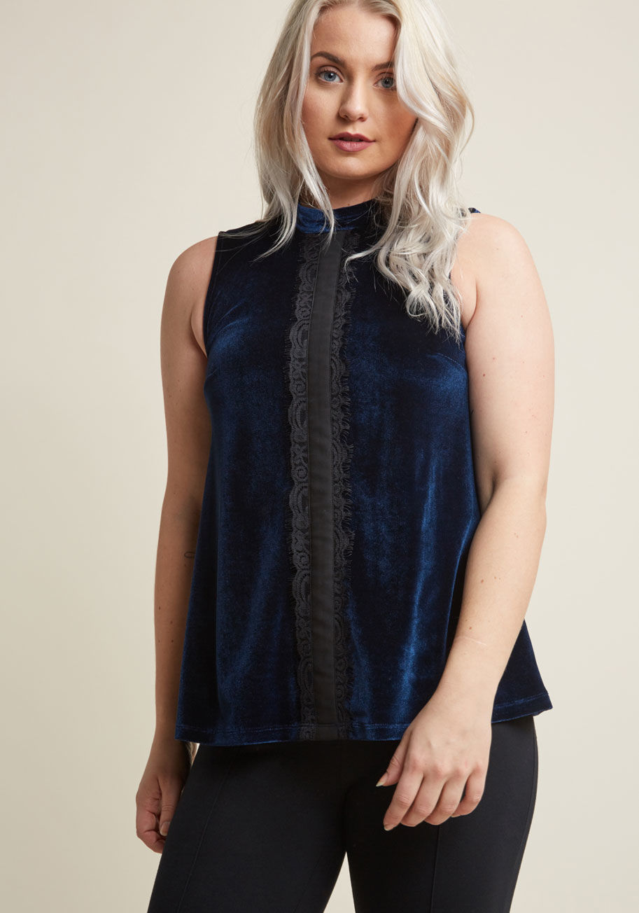 Mct1485 - This velvet top from our ModCloth namesake label proves that layering pieces need not be basic! The back-tied mock neckline, centered lace panel with eyelash fringe, and swingy silhouette of this sleeveless navy blouse can be tucked, left flowing, and sty