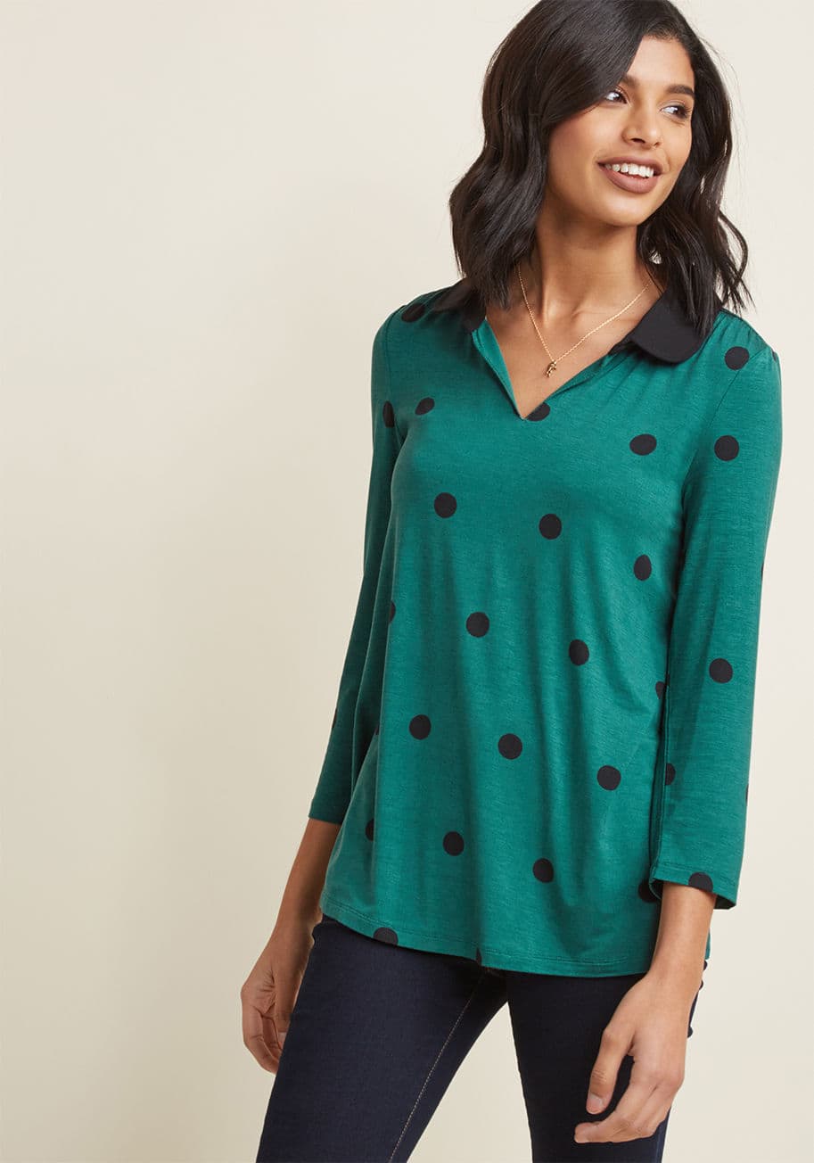 MCT1511A - With its black contrast collar, relaxed V-neck, and cropped sleeves, isn't this jersey knit top just darling? A member of our ModCloth namesake label, this swing-style blouse gets even sweeter with its sprinkling of black polka dots atop a rich green hue,