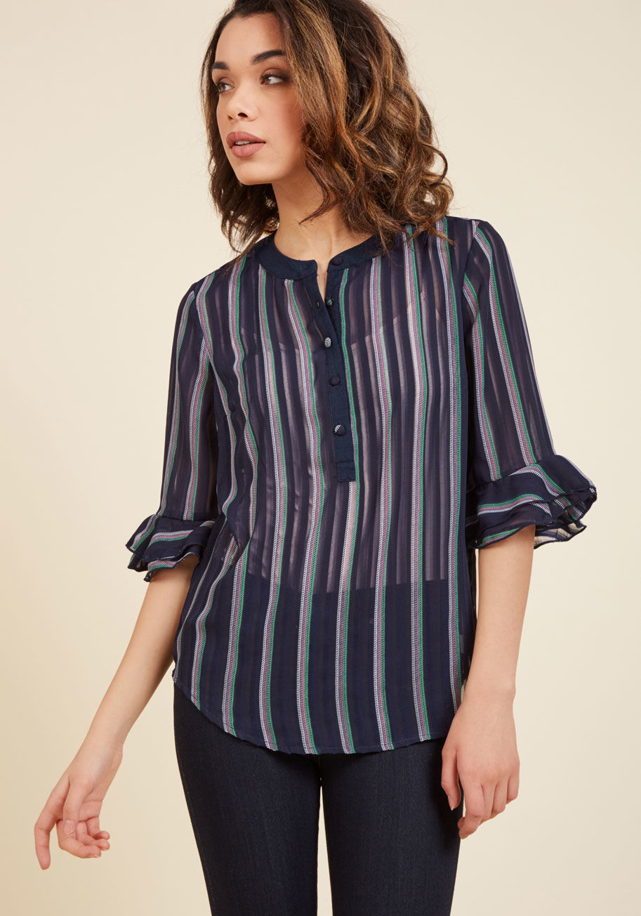 MCT9002 - The chiffon work blouse is such a timeless go-to, but updated with a few fab touches - like a half button placket, ruffled 3/4 sleeves, and sheer stripes mingling with mint, pink, and white lines - you're presented with fresh look that'll feel exciting to