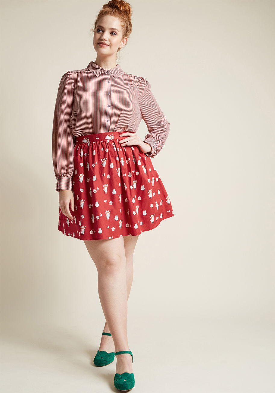 MDB1035 - Here comes Santa Paws, here comes Santa Paws - right on top of this skater skirt from our ModCloth namesake label! Though the quirky design of this cotton A-line needs no introduction, it's festive, caroling kitties and motif of cozy homes and cat-shaped 