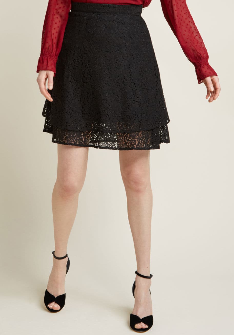 MDB1051 - If ever there was a garment crafted for twirling, it's this black lace mini skirt from our ModCloth namesake label! Given the benefit of dimension with its tiered hemline, this sassy staple piece is one worth giving a whirl.