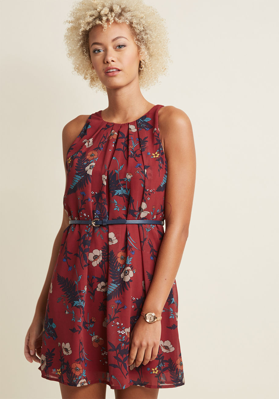 MDD1184 - Don&rsquo;t touch that dial! We've got the secret to an effortlessly awesome outfit, and it&rsquo;s this belted, floral dress from our ModCloth namesake label. This effortlessly fab frock features navy, tan, orange, and burgundy hues, a pleated neckline, 