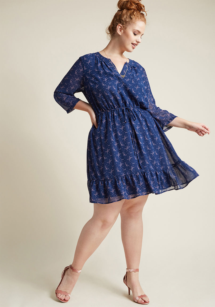 MDD1185A - What wardrobe wouldn't benefit from a trusty style sidekick like this navy blue dress? A reliable offering from our ModCloth namesake label, this chiffon number goes wherever you do with its cropped sleeves, drawstring waist, ruffled hem, and pink star pr