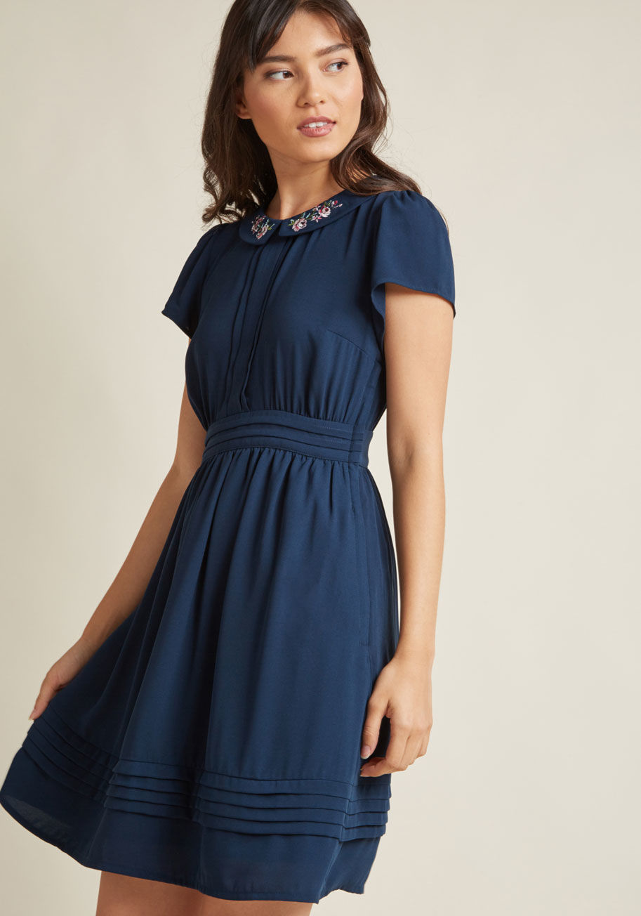 MDD1189 - The goal of your ensemble crafting is to feel pretty and polished, and it's one you'll achieve with this navy shirt dress! An adorable design from our ModCloth namesake label, this chiffon beauty broadcasts your best self with its floral-embroidered colla