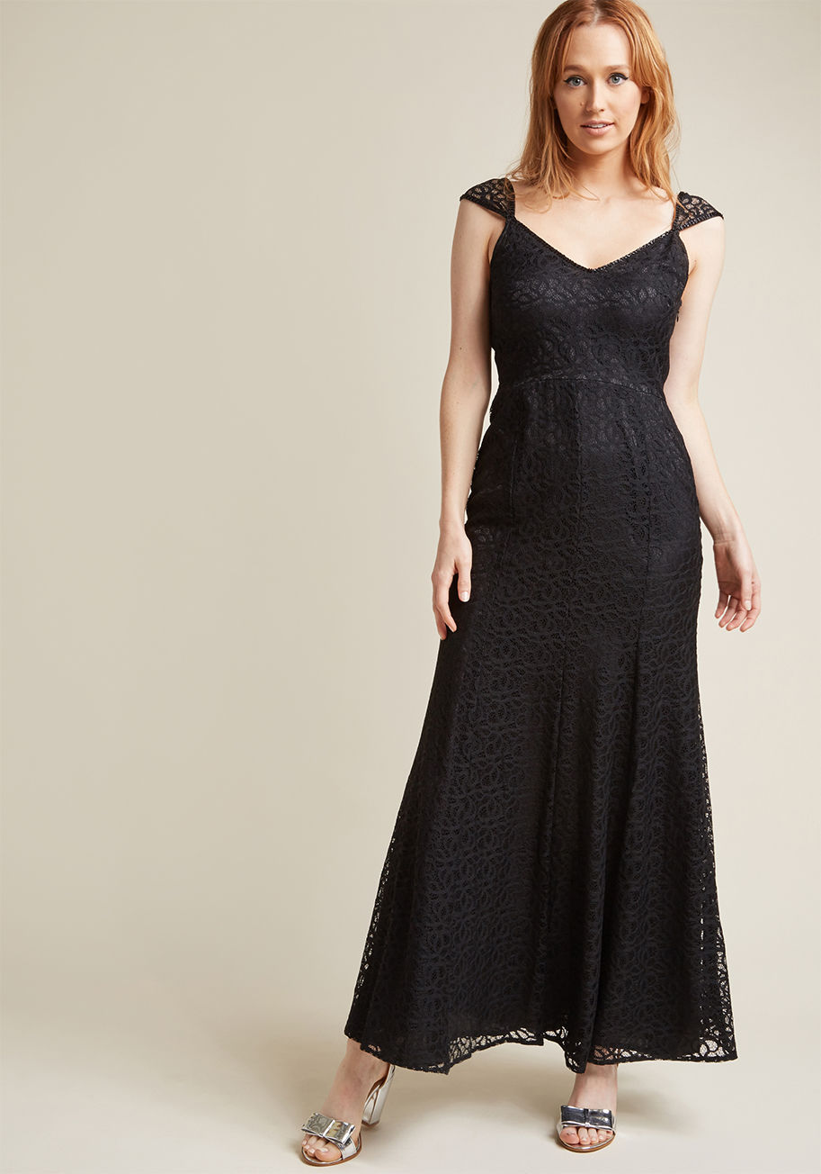 MDD1195 - If you aren't already enamored with glamour, this black maxi dress from our ModCloth namesake label will take you there! Subtly glimmering beads detail the cap sleeves and V-neckline of this lace gown, while its classic cut and silky lining finish off a l