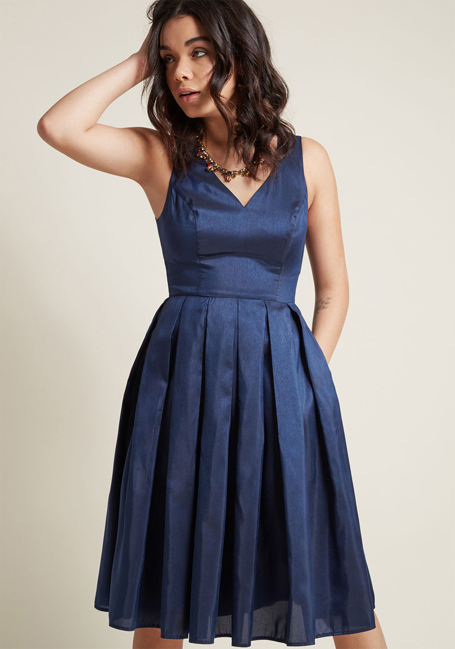 MDD1197 - Opulence is your expertise, which you let everyone know with each clever styling of this navy midi dress! The taffeta fabric of this fit and flare from our ModCloth namesake label infuses every twirl with a subtle sheen, while princess seams, pleats, and 