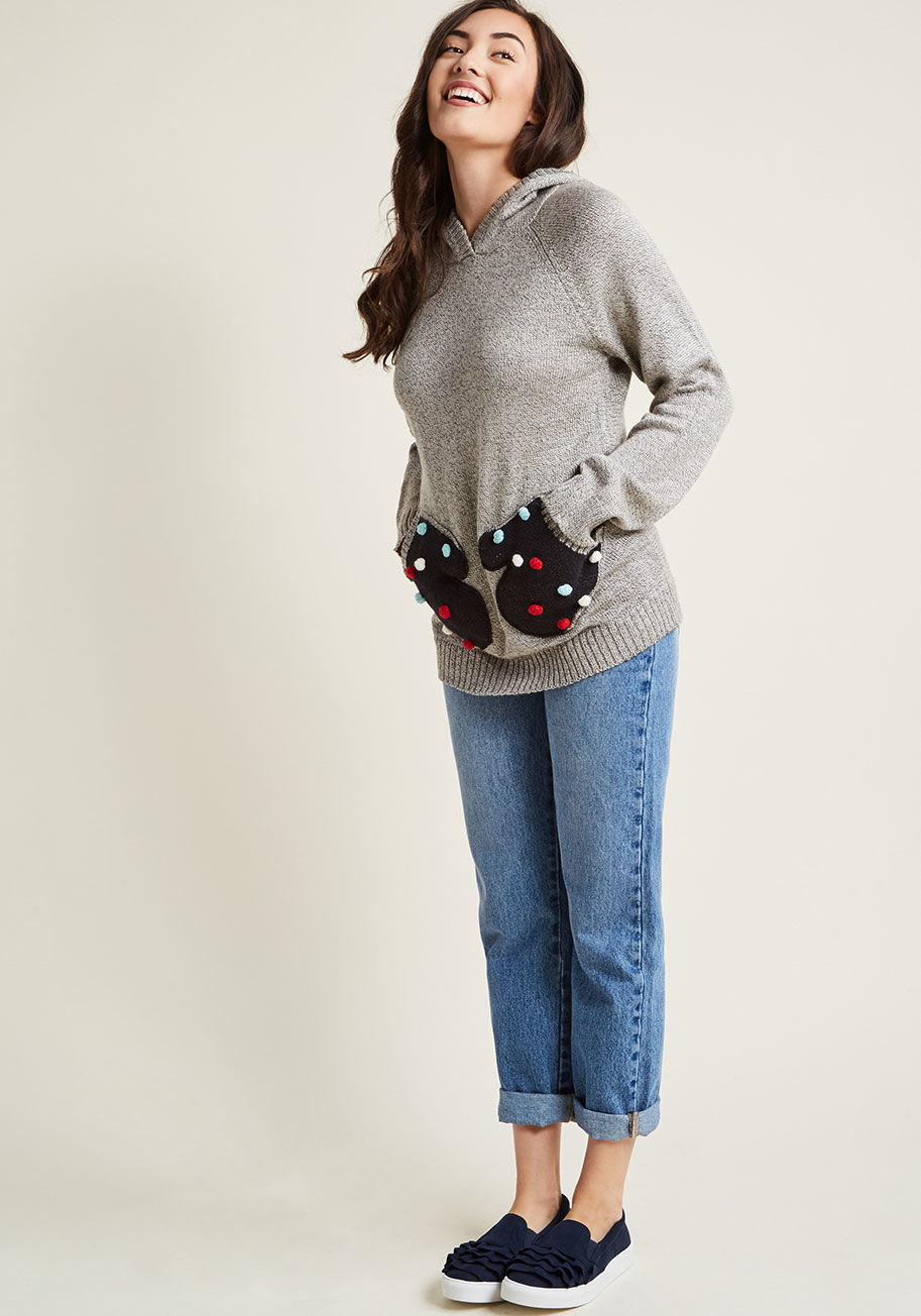 Mds1046A - When it comes to all of the adorable details this grey pullover has to offer, what's not to 'glove'? A cozy hood kicks things off with this ModCloth namesake label sweater, but it's the long sleeves, dark mitten pockets, and colorful pom-poms of this snug