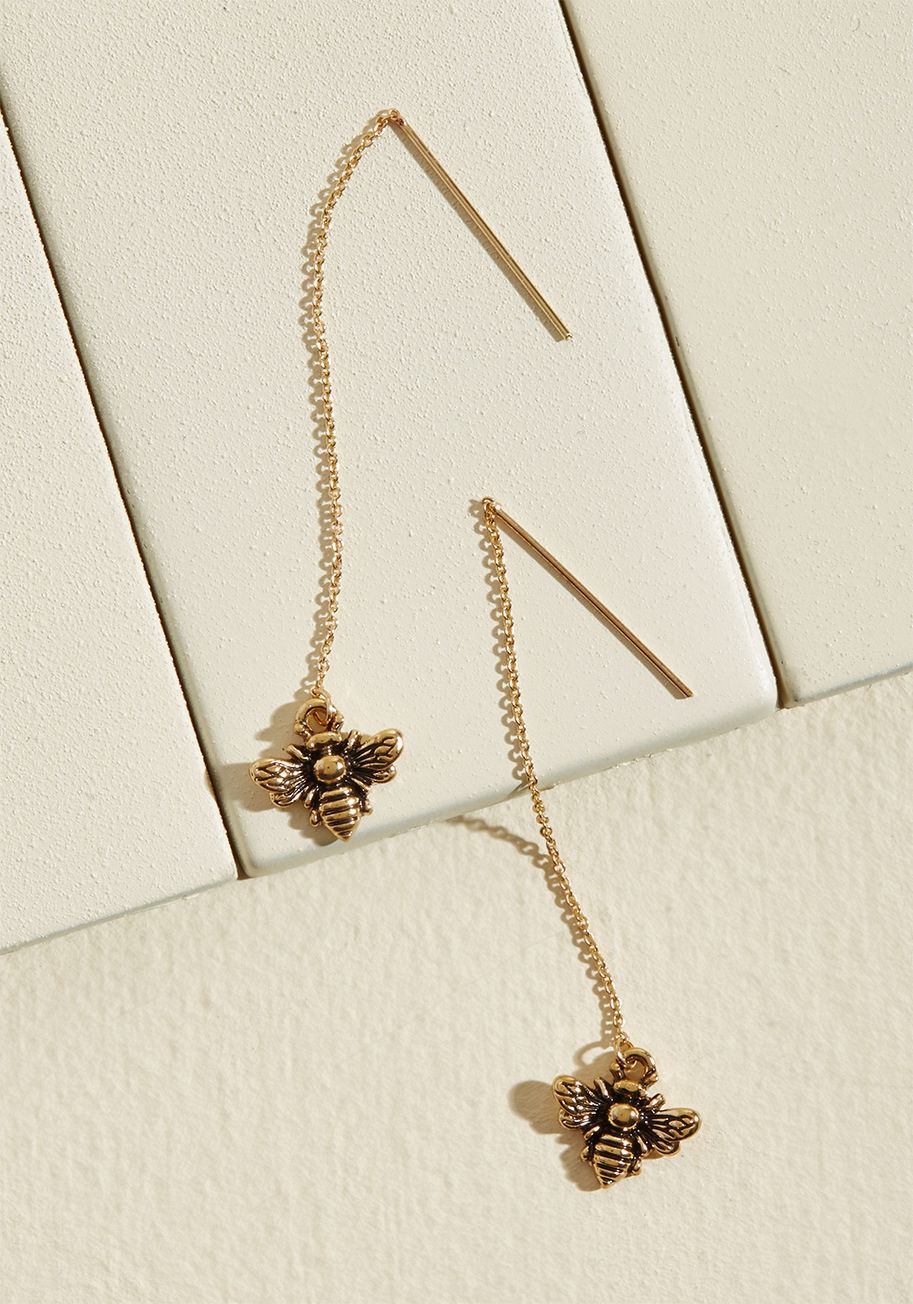 MTM08-1017 - If an impressive occasion is on the agenda, act accordingly by styling these gold threader earrings - a ModCloth-exclusive pair! Dangling from fine chains, sweet bee charms bring a natureful tone into your elegant ensemble.