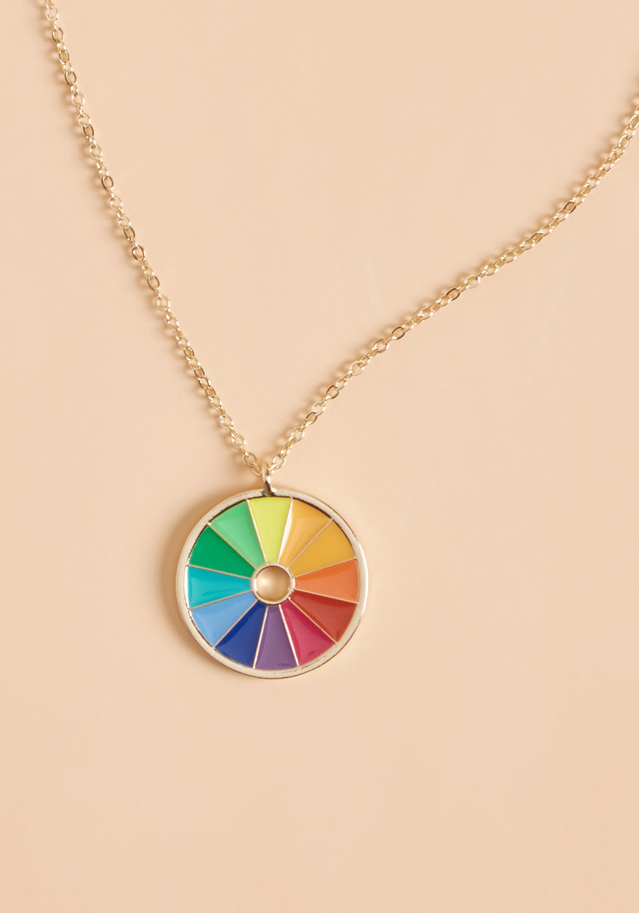 MTM10-1033 - Anywhere you flaunt this color wheel necklace, fun times are sure to follow! A style exclusive to ModCloth, this precious accessory lends its radiant, round rainbow to your most lighthearted affairs.