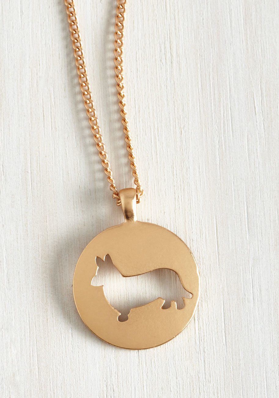 MTM18767 - Whether you&rsquo;re a proud pet parent or simply a dog devotee, you need this golden necklace! A ModCloth exclusive boasting an adjustable curb chain and the silhouette of a corgi