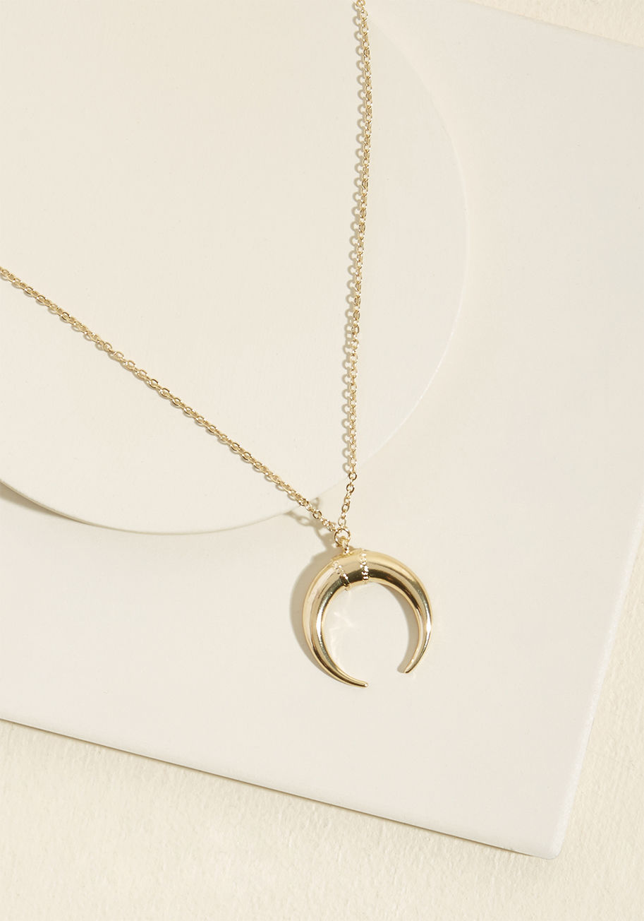 N6556GD - With the ideal golden glisten, a blissfully delicate cable chain, and an eye-catching double horn charm, this everyday accessory may just be